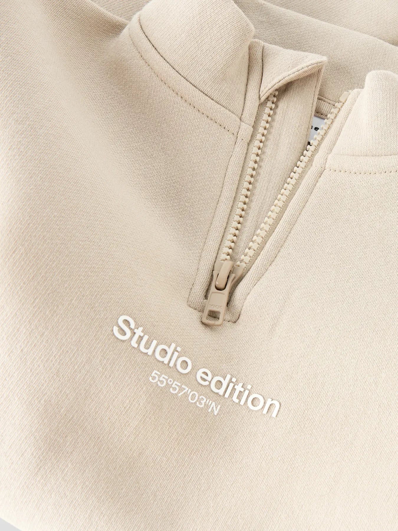 Ziptröja studio edition beige