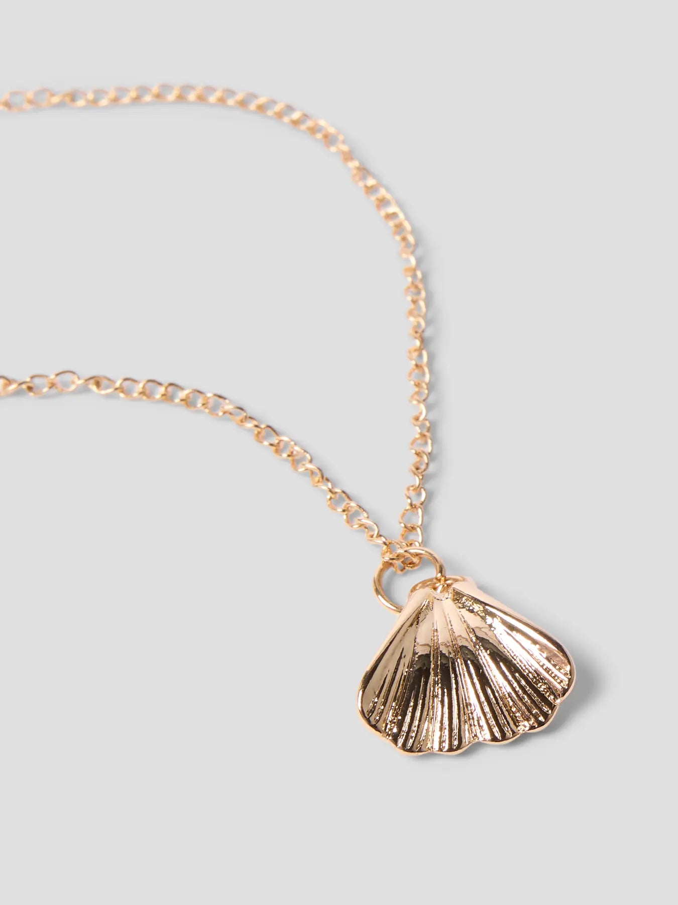 Halsband snäcka guld