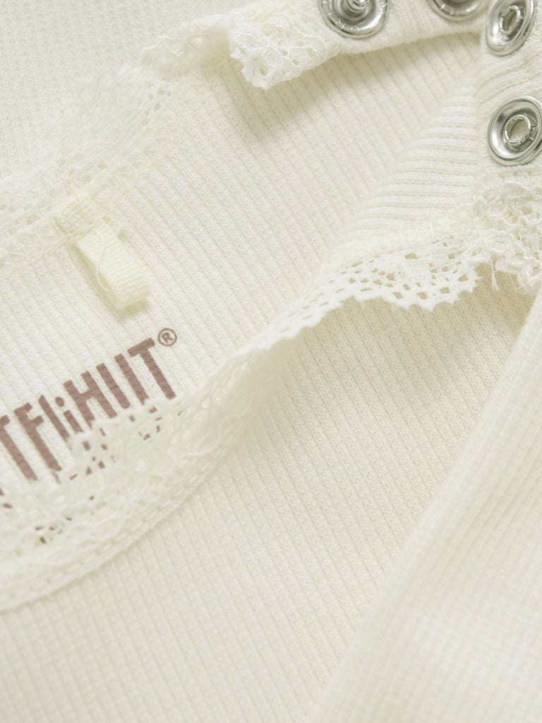 Ribbad vit body i tencel