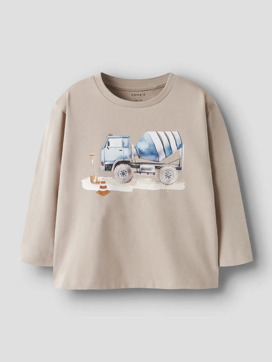 Beige tröja med betongbil