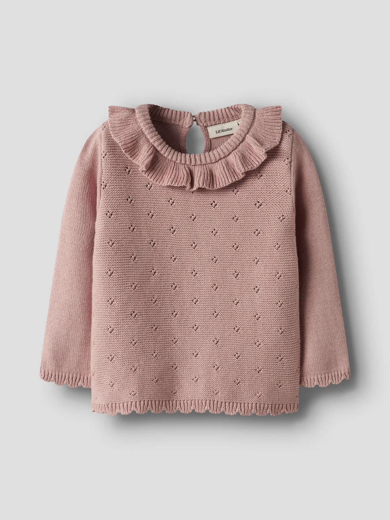 Stickad tröja med krage