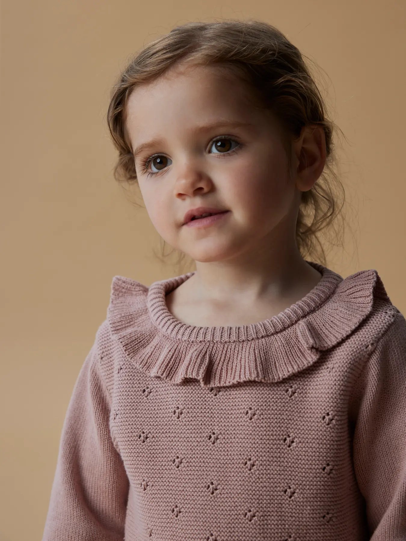 Stickad tröja med krage