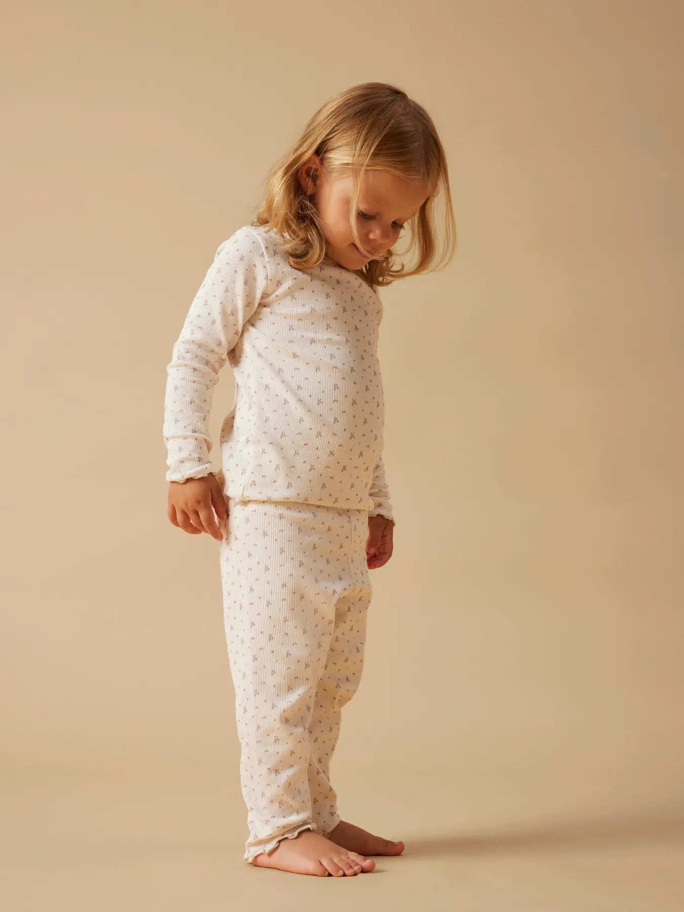 Ljusrosa pyjamas blommor