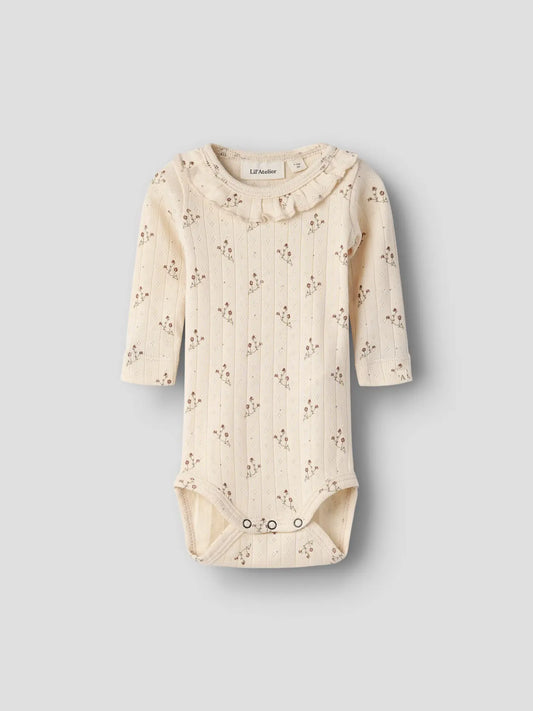 Body med blomkvistar